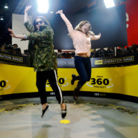 Las Vegas, Nevada. Jan. 5, 2015. Co-workers Donatella Caggiano, left, and Cheri Quigley, jump as 48 Nikon D750 cameras capture them in the Nikon 360 degrees project inside the Las Vegas Convention Center at CES 2015.  (Photo by: Pankaj Khadka/BUNS)